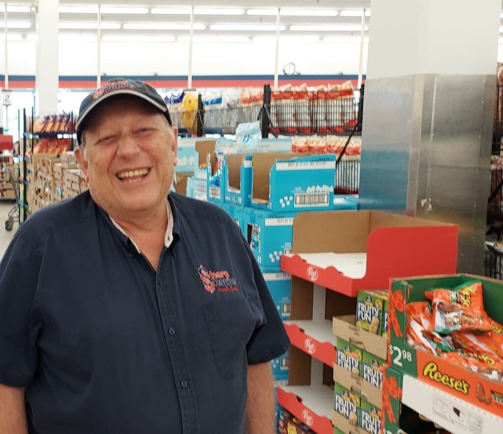 Sharp Shoppers employee, David, in the store.